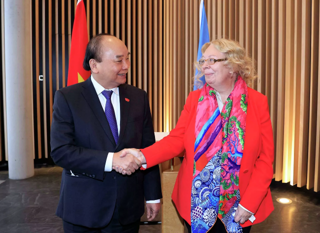 Chủ tịch nước Nguyễn Xuân Phúc gặp Tổng giám đốc Văn phòng Liên hợp quốc, bà Tatiana Valovaya tại Geneve.